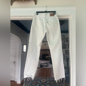 🛑SOLDDistressed white 501 Levi’s tagged 27x30, but see measurements!! 100%cotton